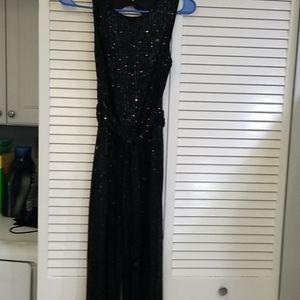 Black sequined belted backless jump suit